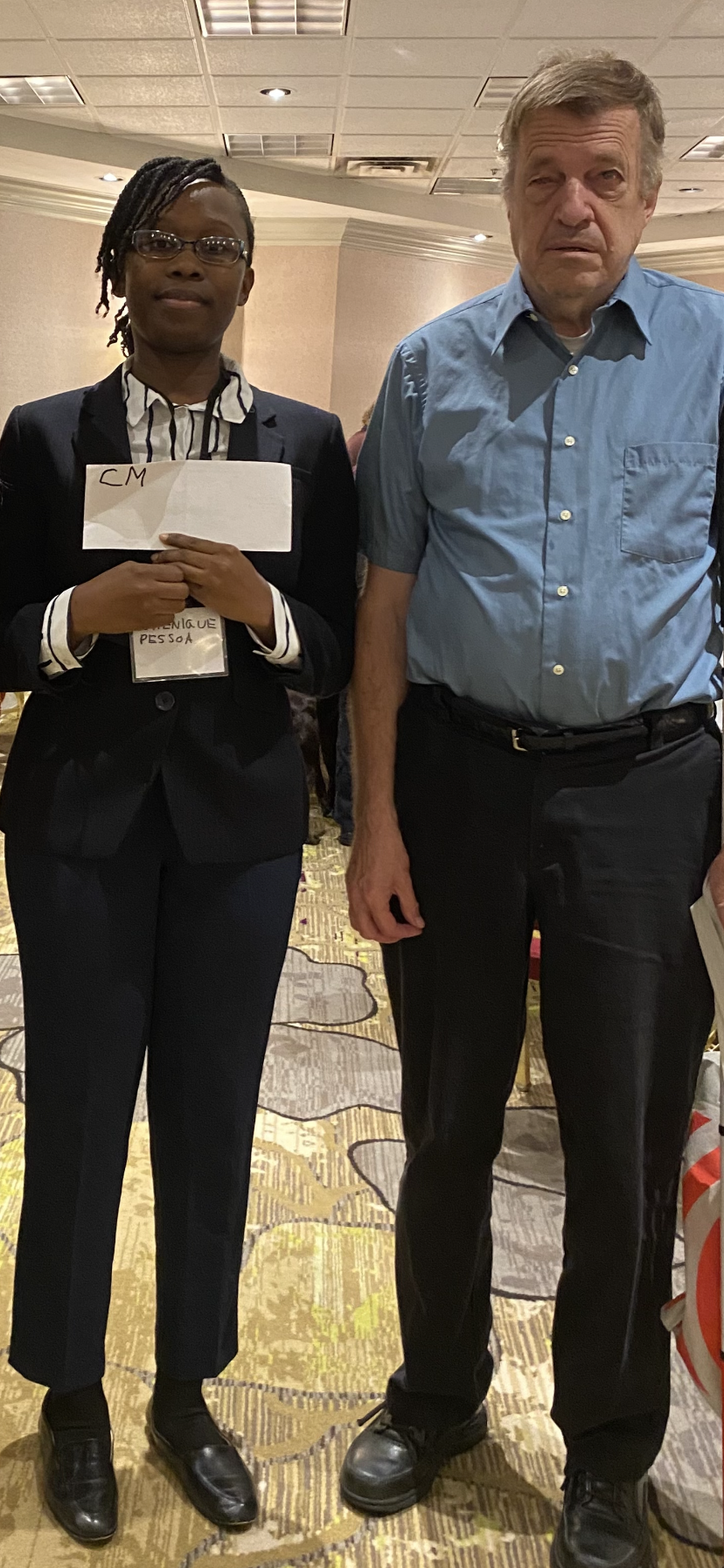 Photo of GNYCB Board Member Robert White standing with ACBNY Scholarship Winner